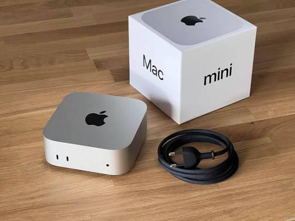 Mac mini con caja y cable